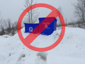 blue boxes on snow bank